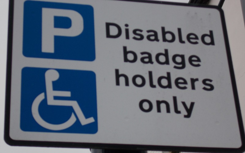 A blue badge parking sign