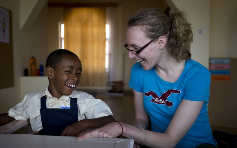 Sophie Christiansen with a disabled child in Rwanda