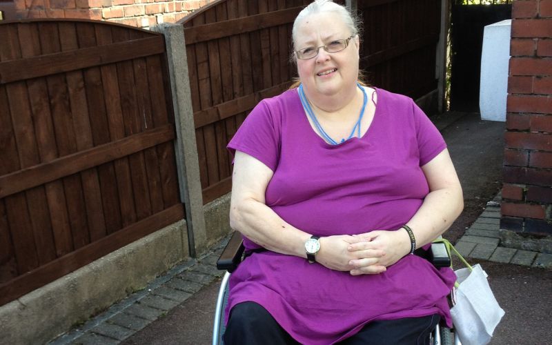 Jo Jones sitting in wheelchair