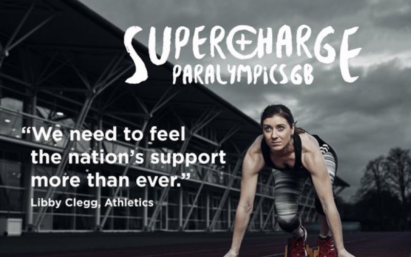 Poster showing Libby Clegg crouching at the start of a race below the word: Supercharge ParalympicsGB