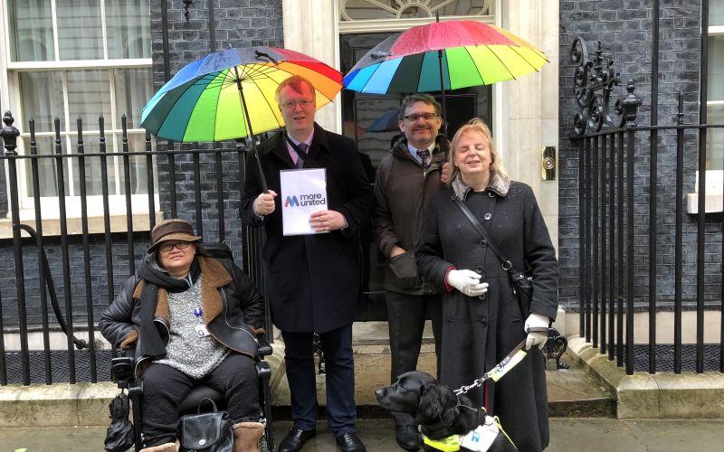 Lisney, Buxton, Hart and Brothers (and her guide dog) outside 10 Downing Street