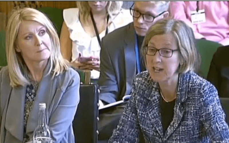 Sarah Newton giving evidence to the committee as Esther McVey watches on beside her